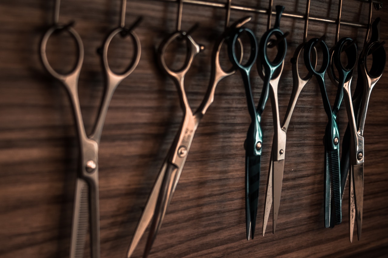 Thinning scissors hang on the wall